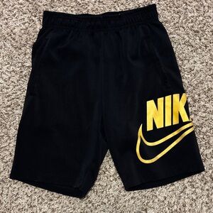 Nike Men's Black Shorts with Gold Logo